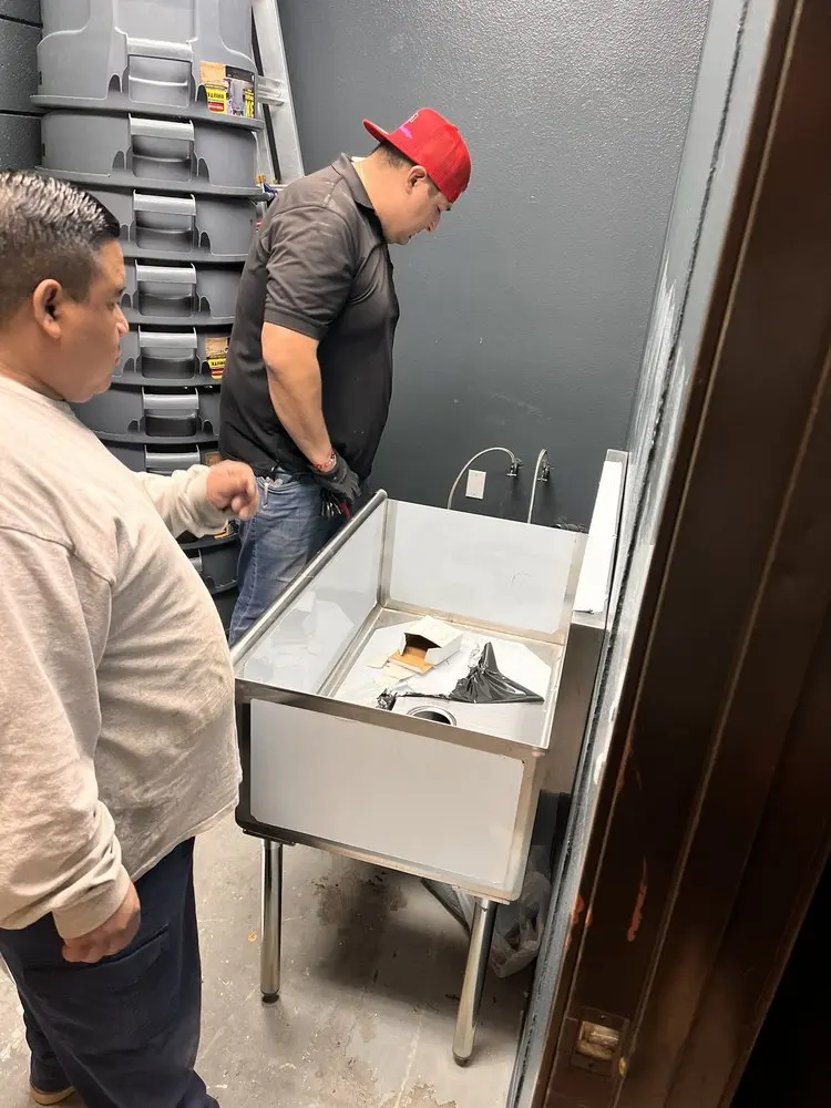 Commercial plumbing and sink installation in Carlos